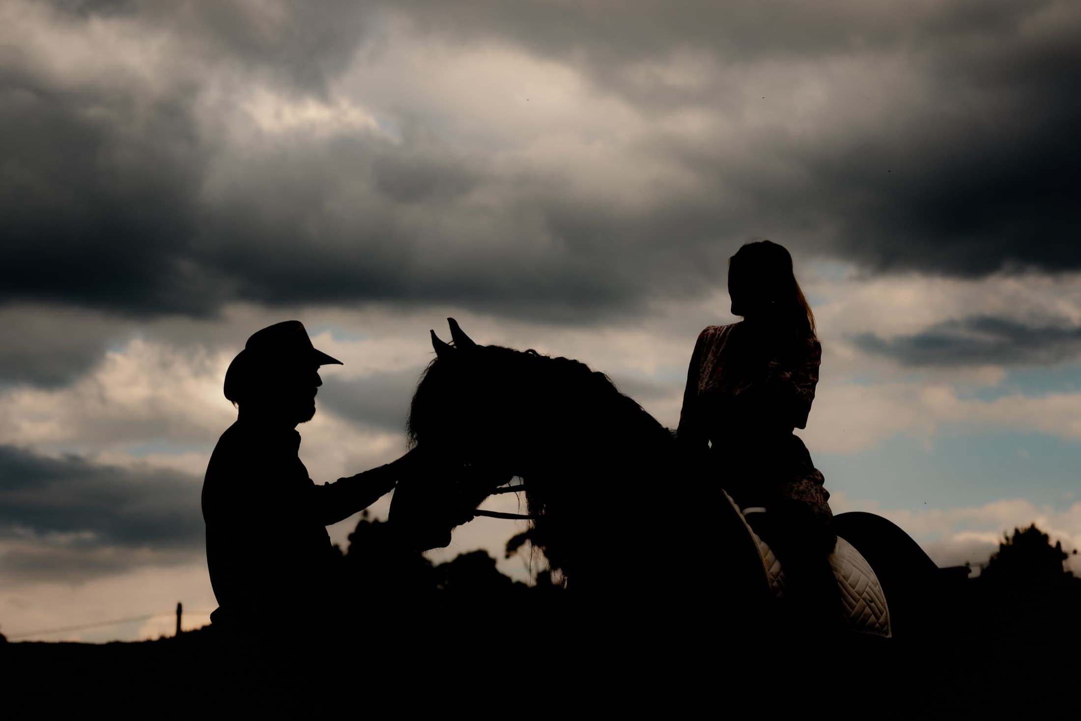 Horse riders crossing the mountain landscape of Țara Dornelor